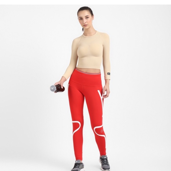 ADIDAS
Women Solid Round Neck Beige T-Shirt - Picture 6 of 9